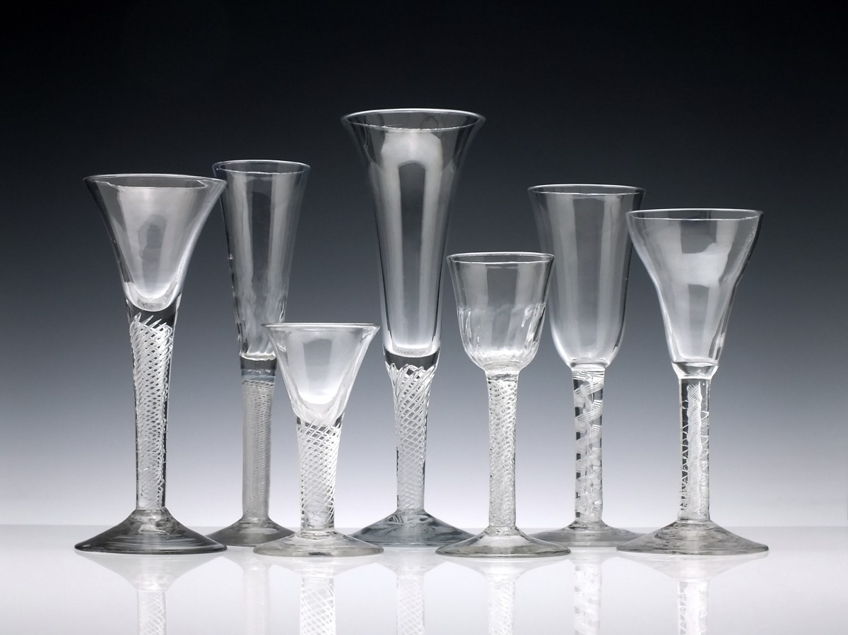 https://www.exhibitantiques.com/uploads/tinymce/Articles/Antique%20Drinking%20Glasses%20Air%20Twist%20Identification/Antique-Drinking-Glasses.JPG